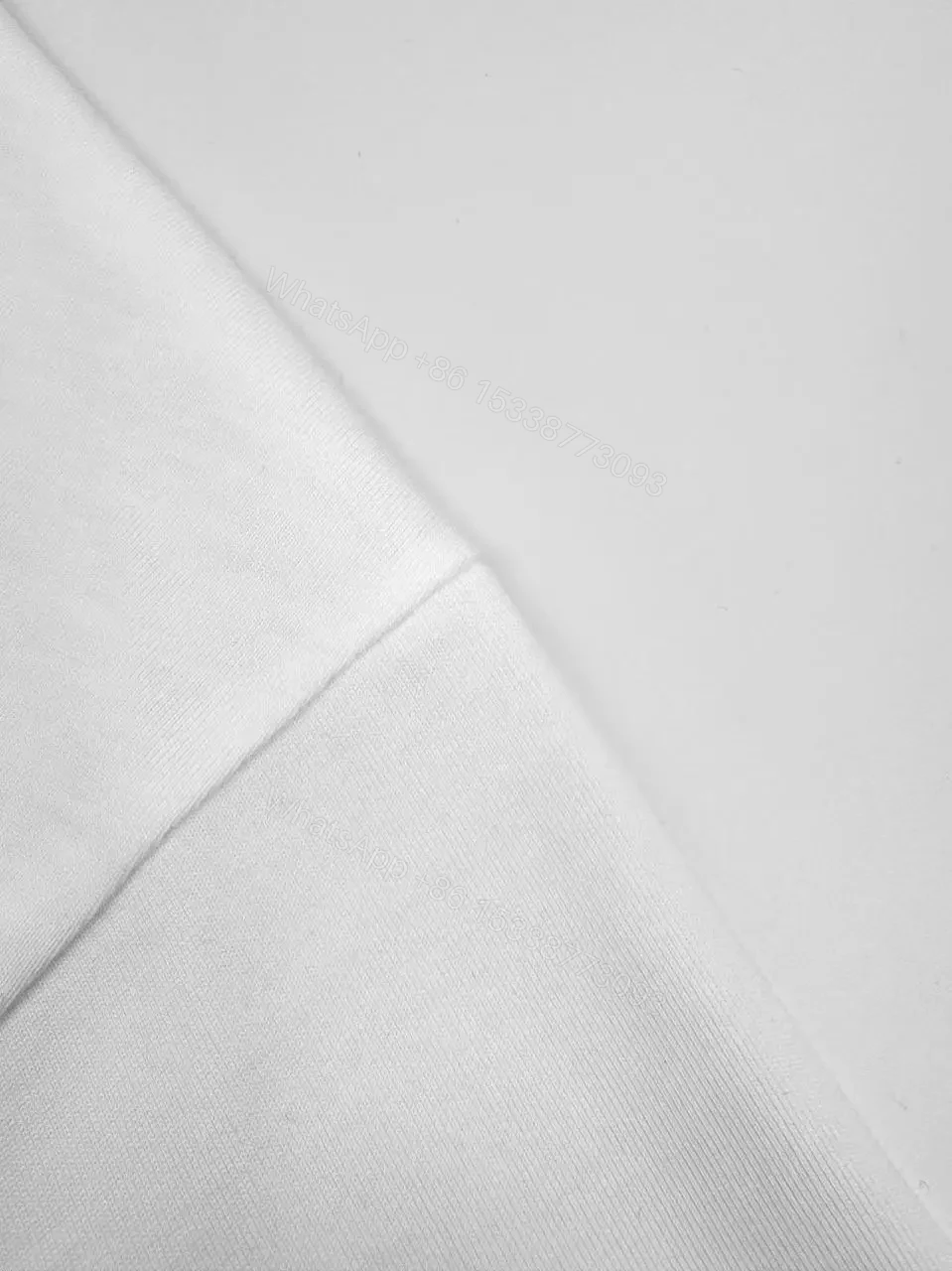 View 2 of White Cotton Minimalist Logo Tee with Signature Graphic
