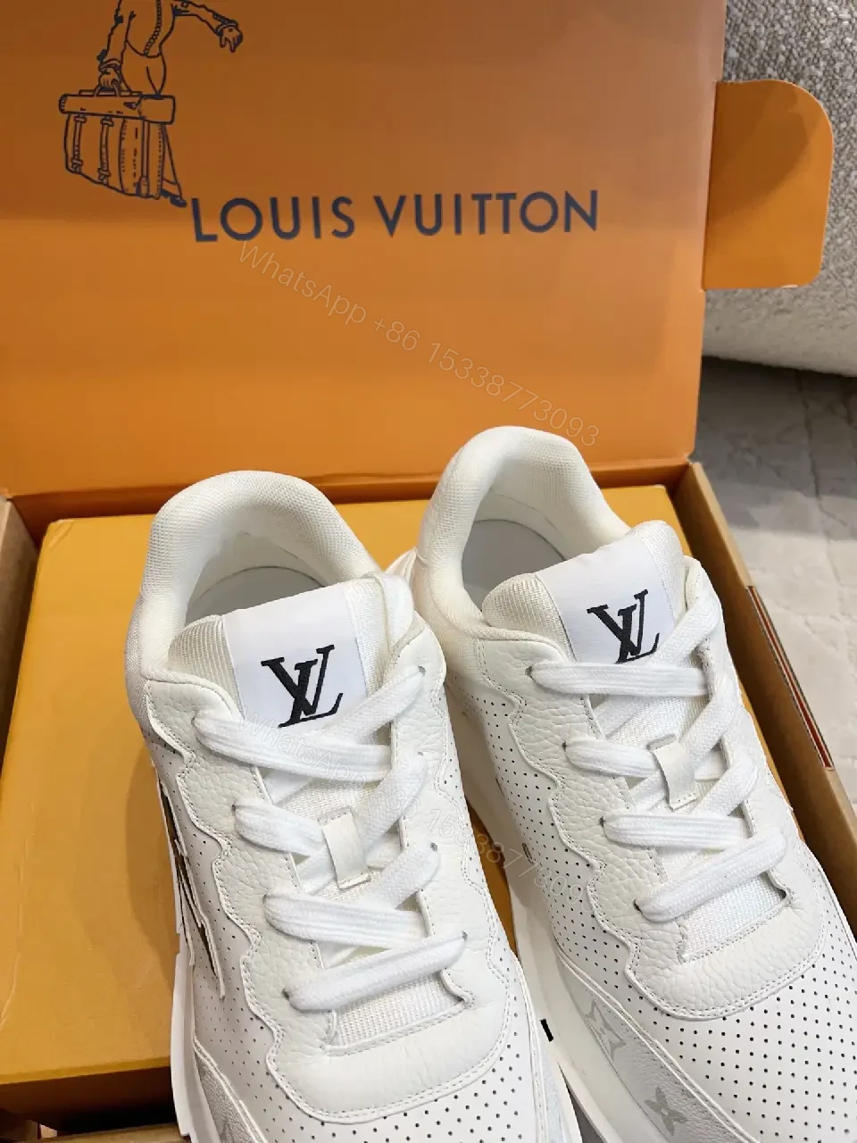View 3 of White Leather Runner Sneakers Perforated Mesh Modern LV Logo Accent Shoes