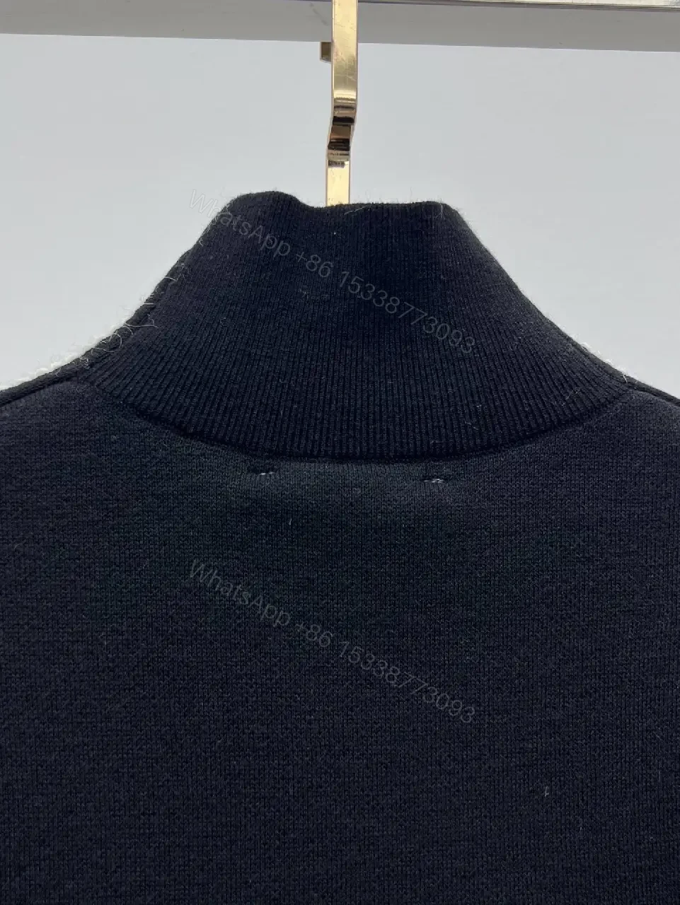 View 9 of Elegant Knit Turtleneck with Signature Embroidery, Black Knit Dishive
