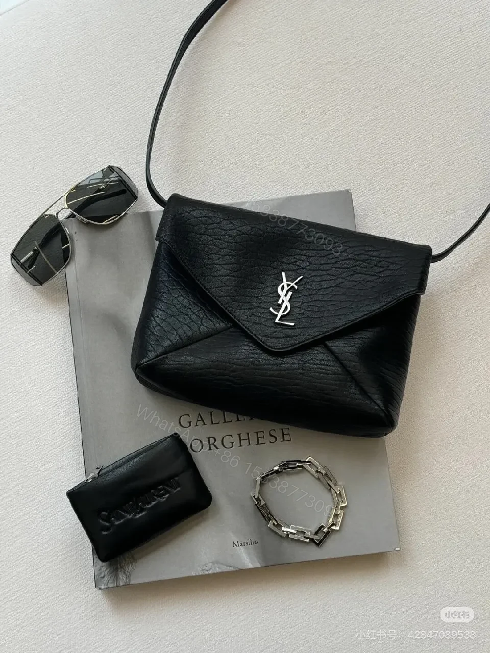 Black Textured Leather Envelope Bag – Minimal Logo, Compact & Versatile — view 1