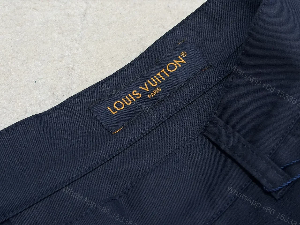 View 6 of Navy Cargo Shorts with Louis Vuitton Logo Embossed Key Features Short