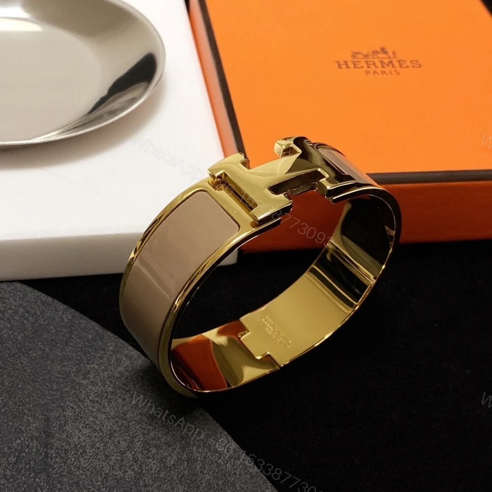 View 4 of Hermes Clic H Wide Bracelet Gold & Beige