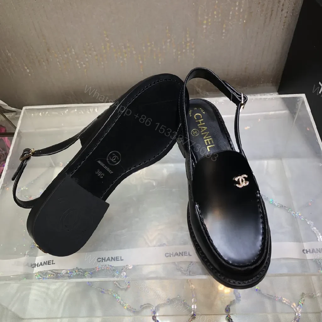 View 6 of Black Leather Mules with Gold Logo Hardware, Minimal Slider Mule