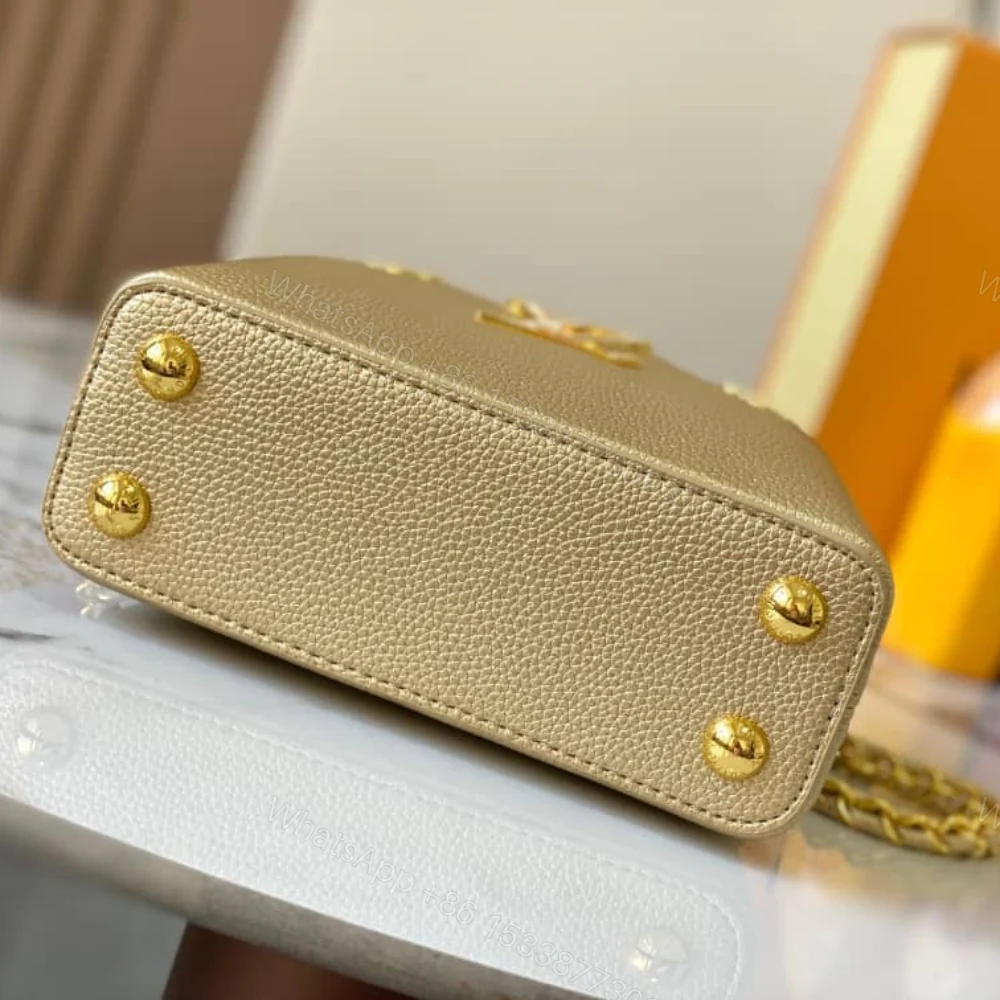 View 4 of Louis Vuitton Capucines Bag Gold 21Cm M24583