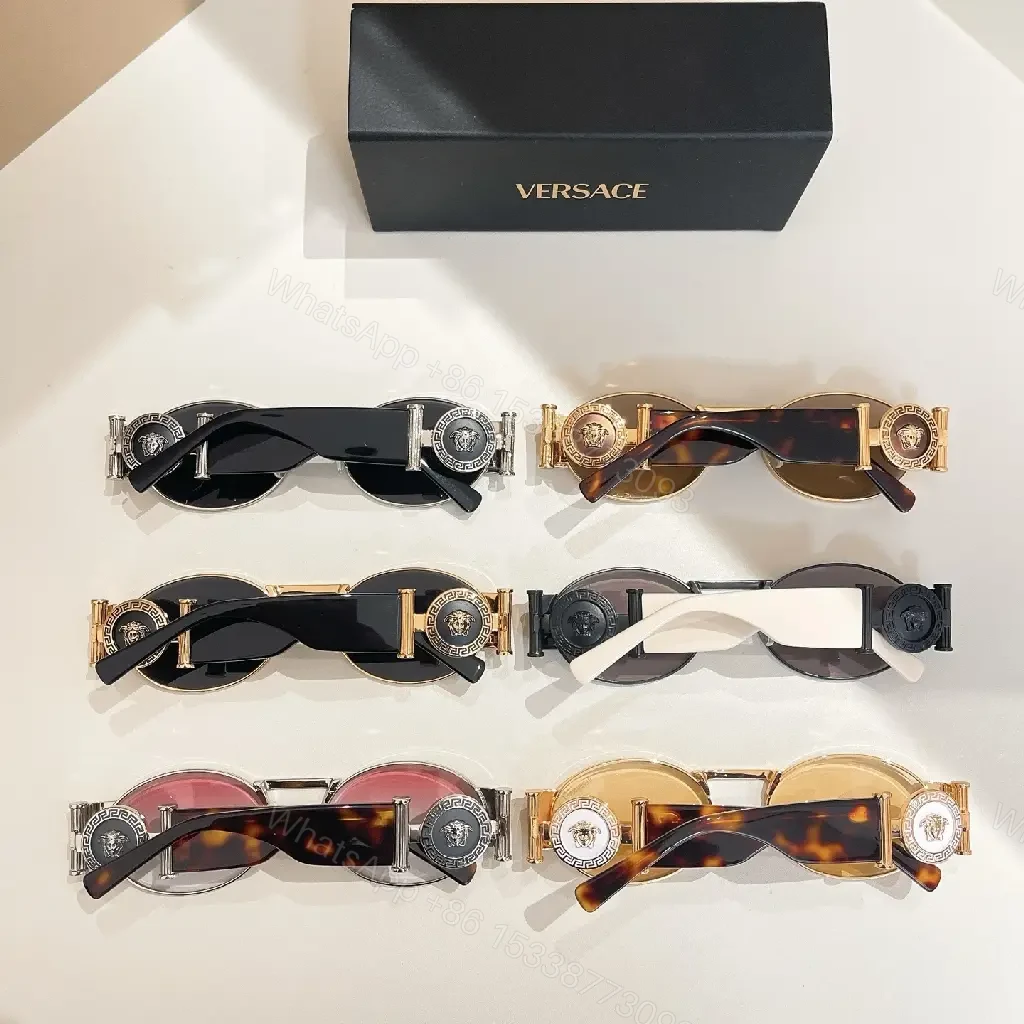 View 5 of Amber-Tinted Round Sunglasses: Gold-Accent, Sculpted Hardware, UV400 Shield