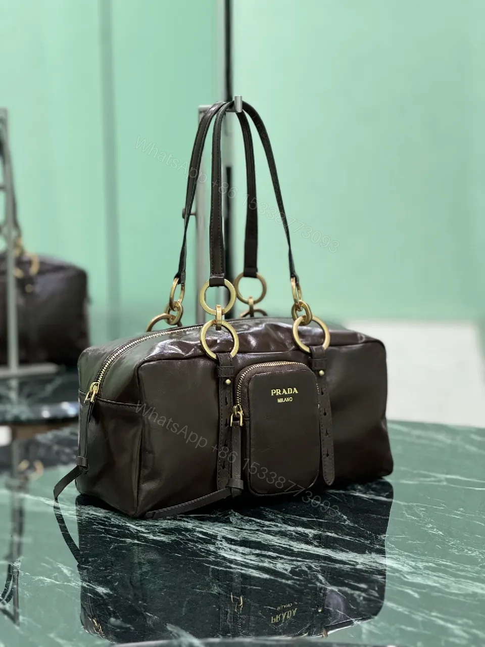 View 2 of Chic Black Leather Handbag with Gold Hardware & Structure