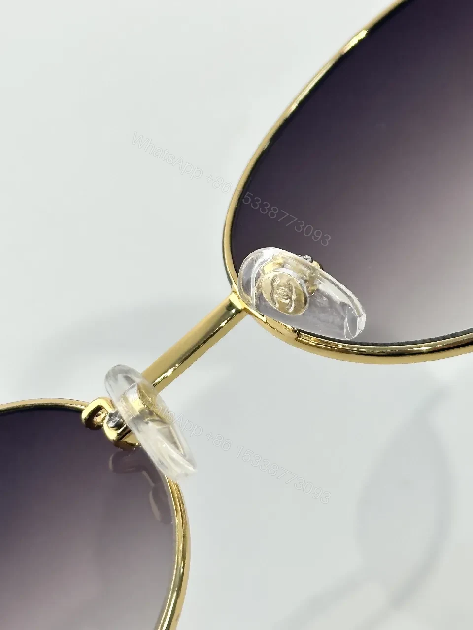 View 4 of Gold-Accented Round Sunglasses: Minimal Luxury Shield