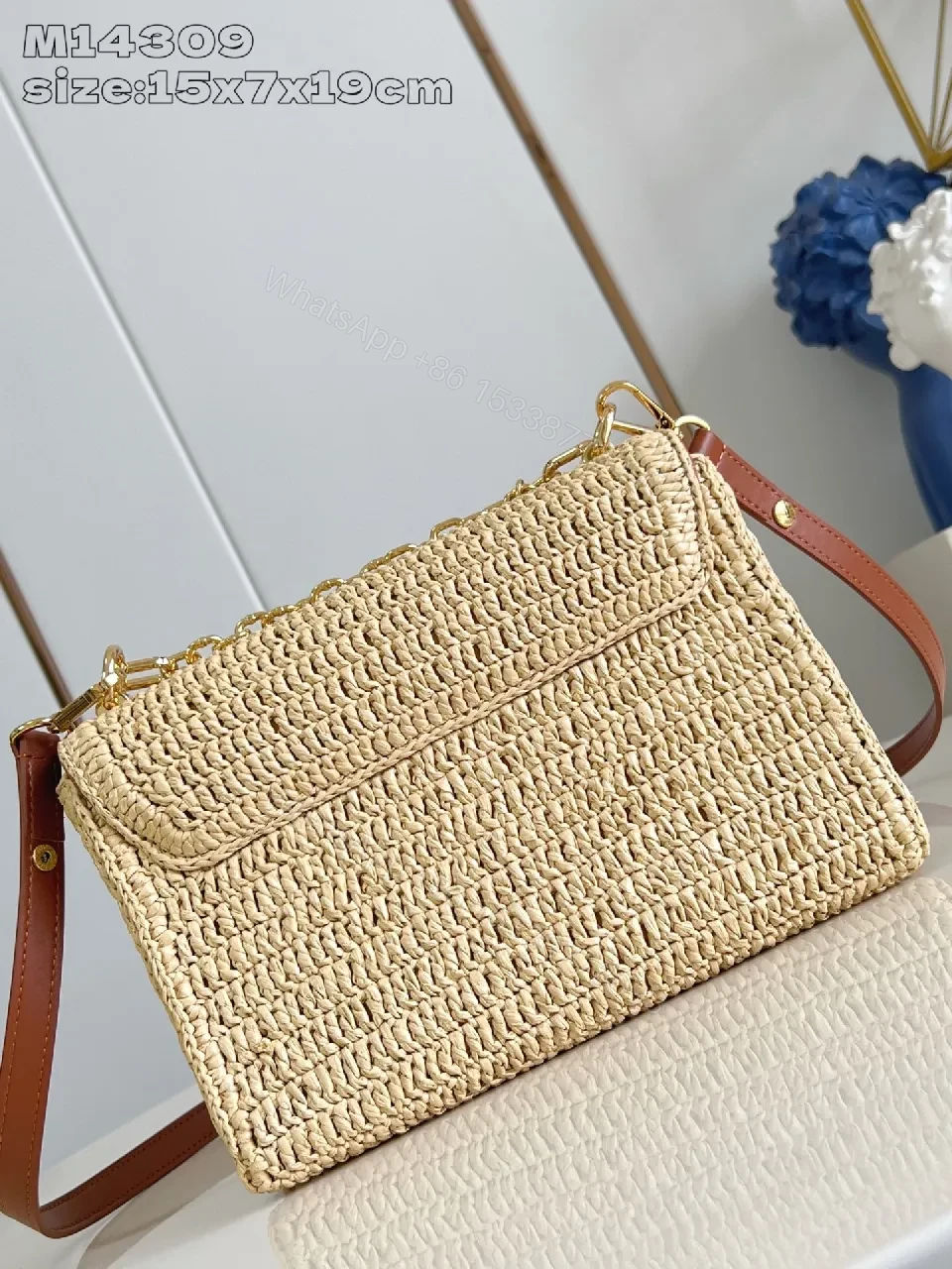 View 6 of Elegant Woven Straw Shoulder Bag with Gold Hardware