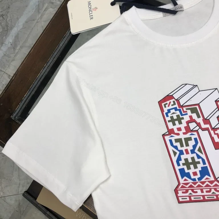 View 9 of Graphic Moncler Tee: Bold M Motif in Premium White Cotton Tee