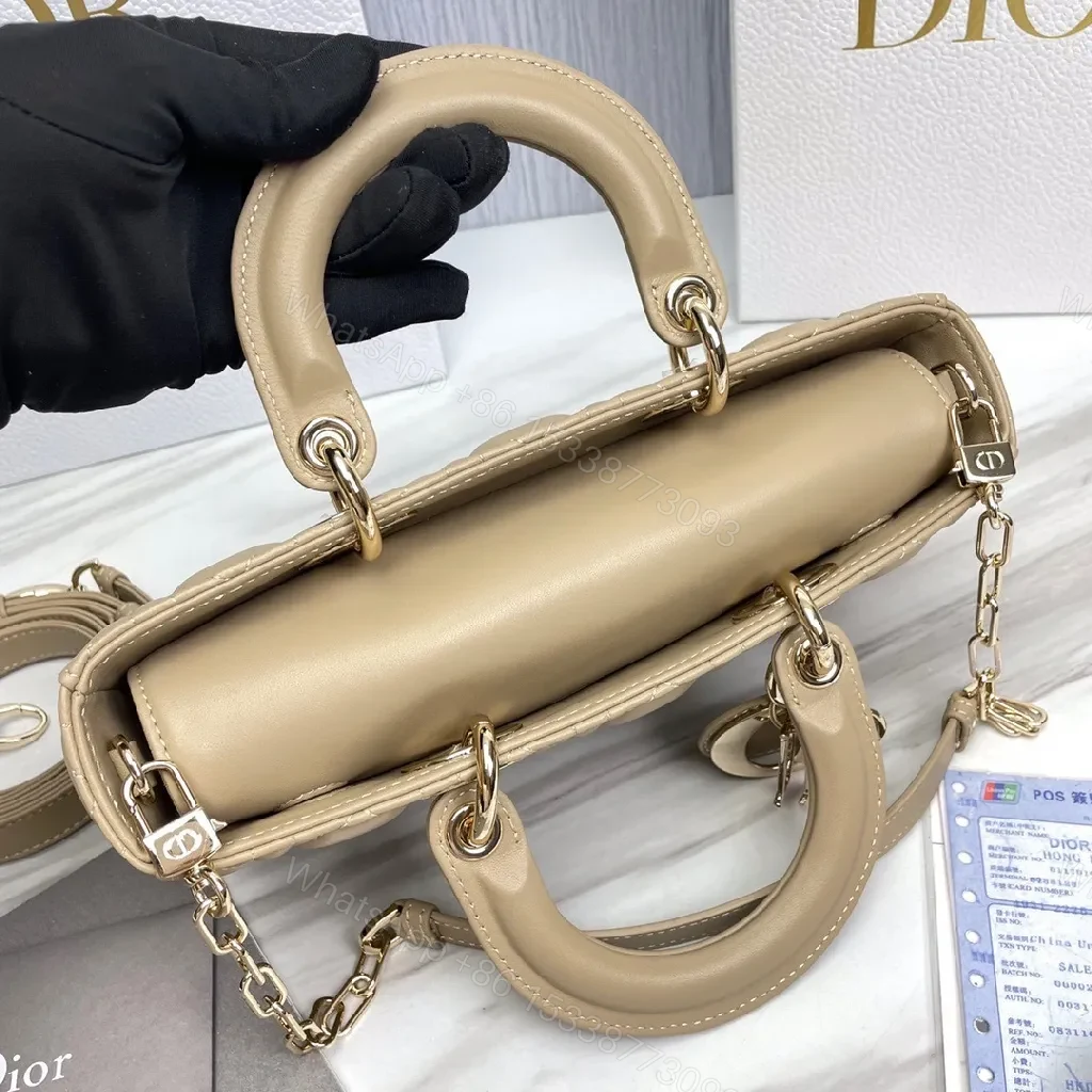 View 2 of Nude Calfskin Quilted Mini Handbag—Top Handle, Dior Hardware