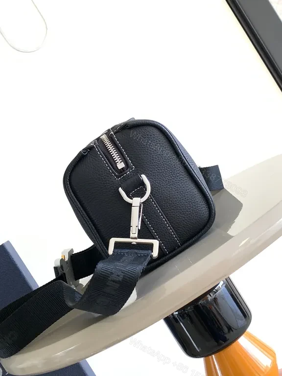 View 9 of Sleek Black Pebbled Leather Dior Crossbody Bag - Compact Couture