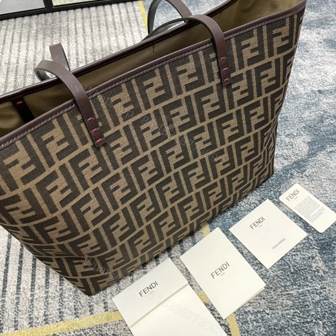 View 8 of Fendi Tobacco Blue Zucca Print Coated Canvas Medium Roll Tote Bag