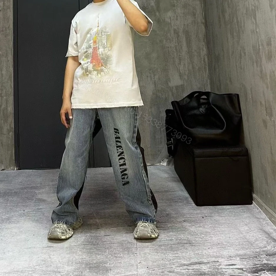 View 16 of 高仿Balenciaga*SS24系列783697塗層字面牛仔褲
