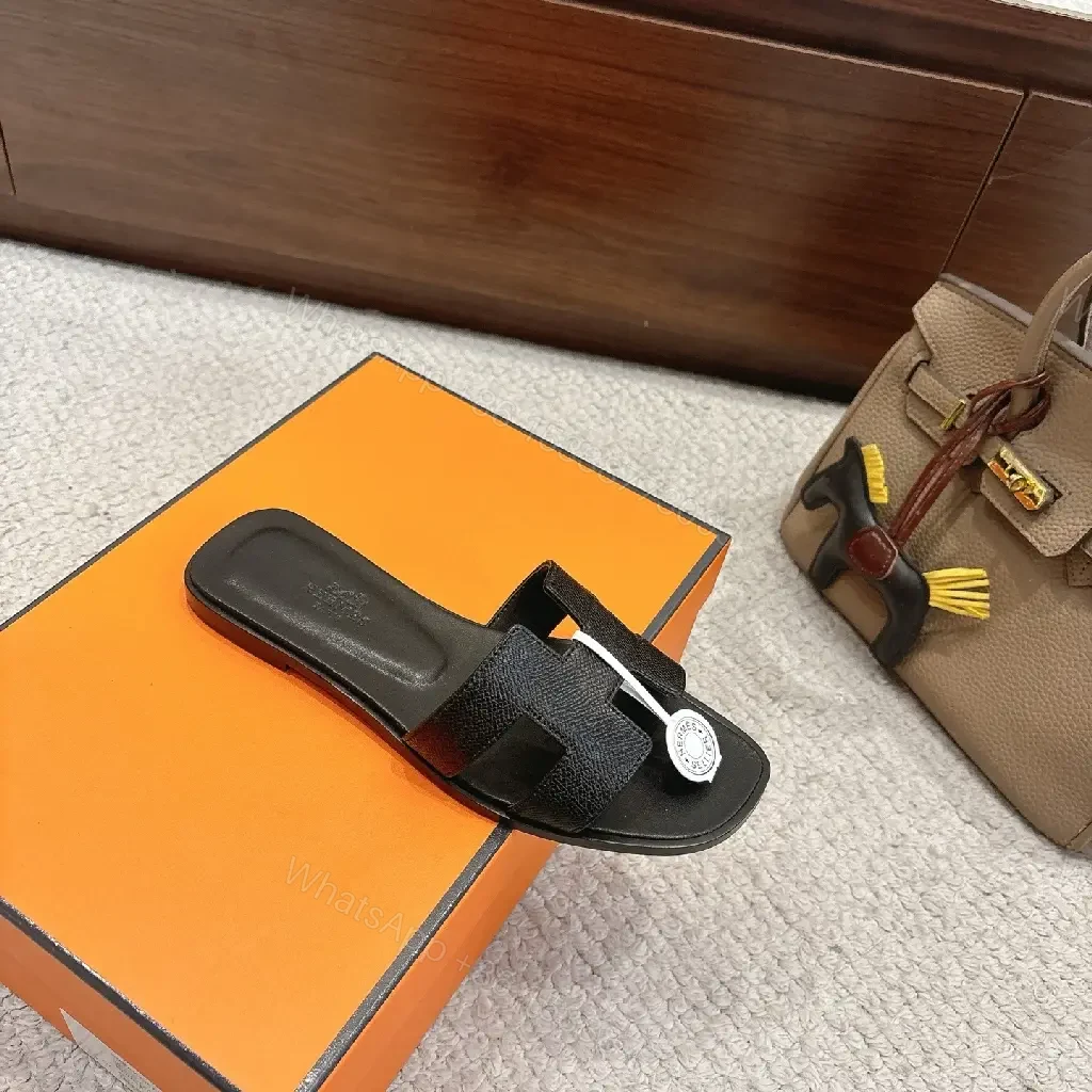 View 8 of Black Leather Minimalist Slides with Signature Cross‐Band