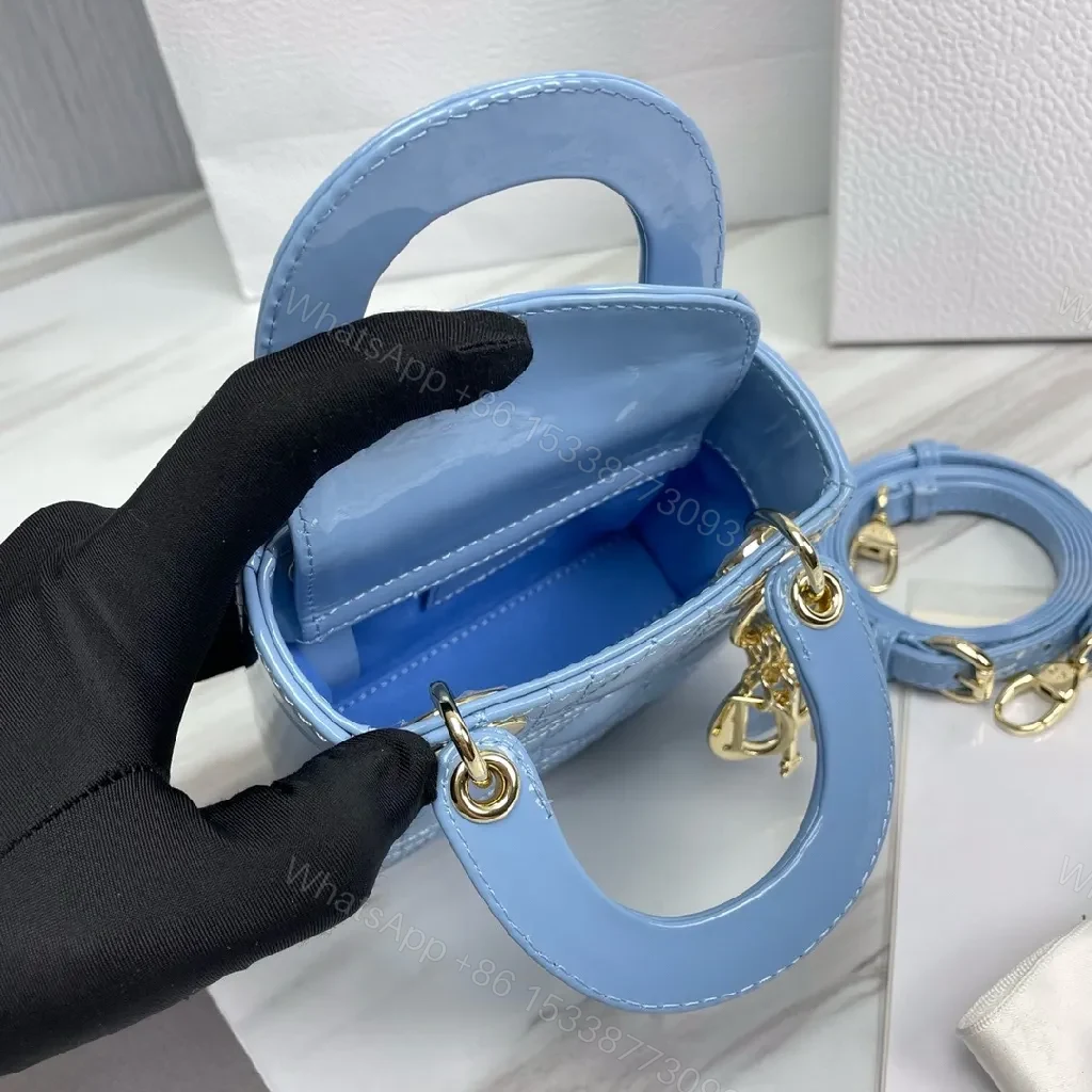 View 4 of Blue Quilted Mini Bag - Calf Leather, Crossbody/Top Handle, Magnetic Closure