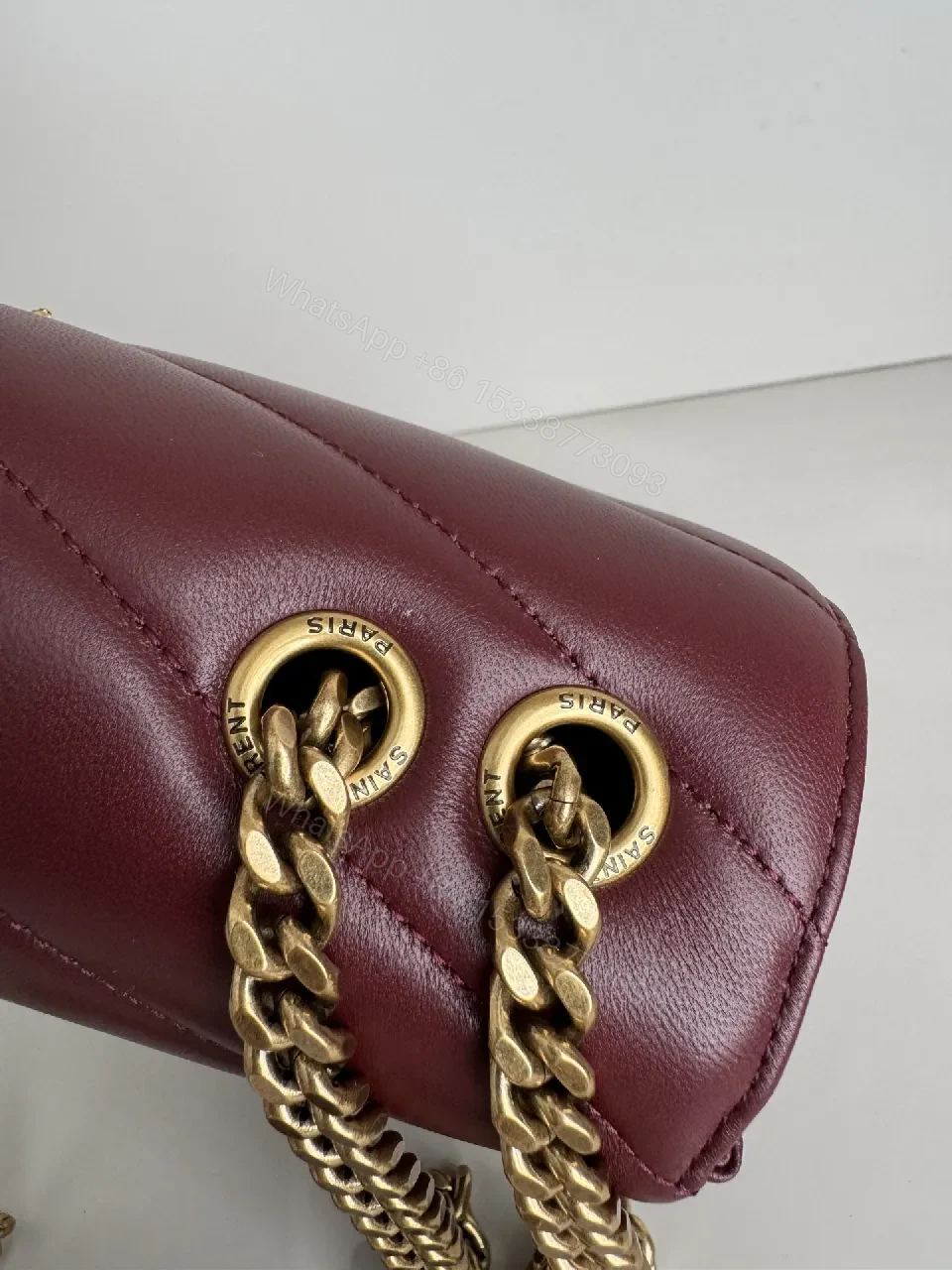 View 4 of Burgundy Quilted Satchel with Gold Chain Detail