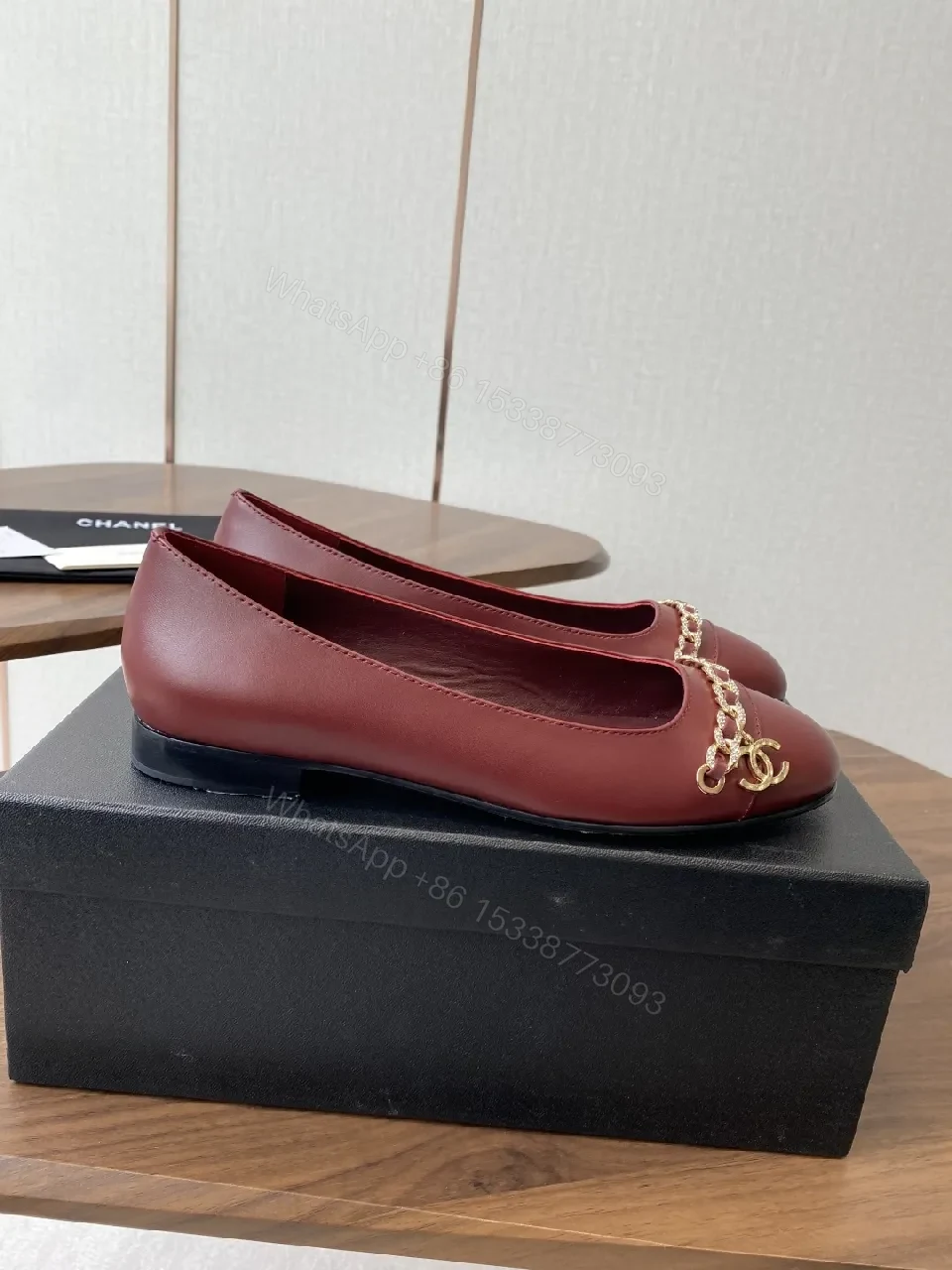 View 3 of Burgundy Leather Flats with Gold Chain Detail - Everyday Luxury
