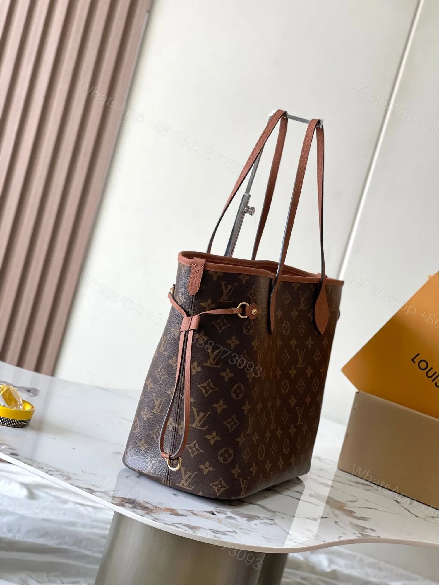 View 2 of LV NEVERFULL INSIDE OUT MM IN BROWN MONOGRAM CANVAS AND CALFSKIN TRIM