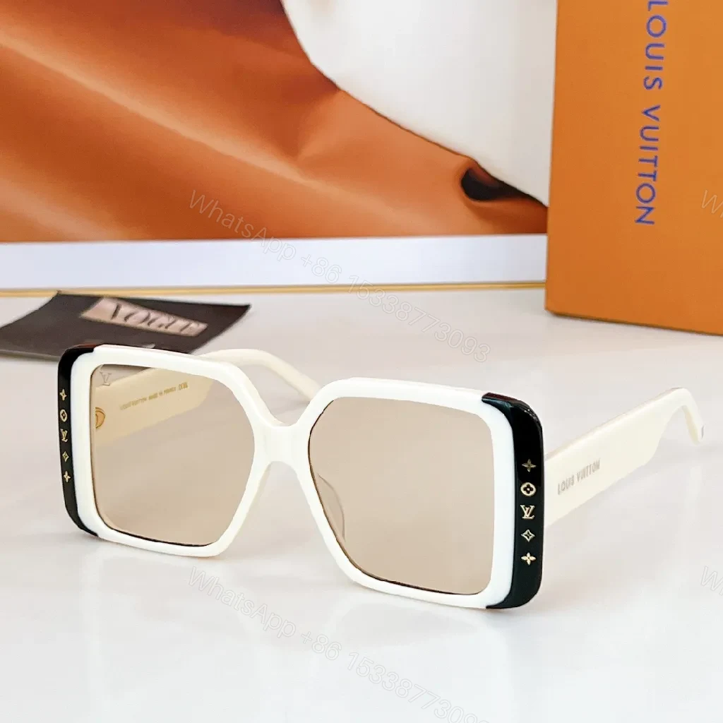 View 8 of Bold Black & White Frame Sunglasses with LV Detailing Luxe