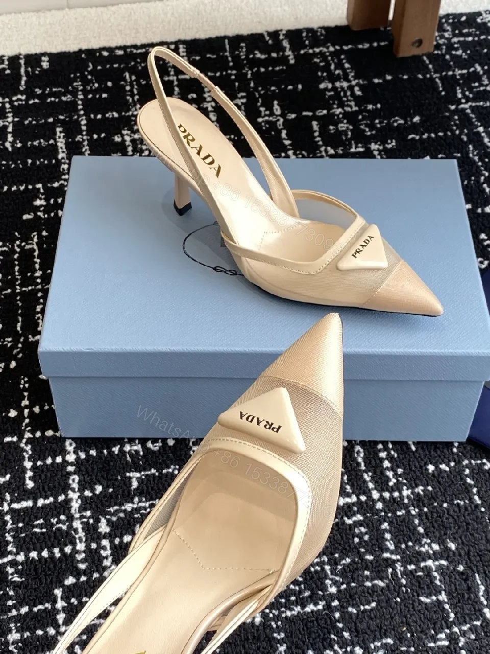 View 4 of Elegant Leather Slingbacks with Triangle Logo Detail