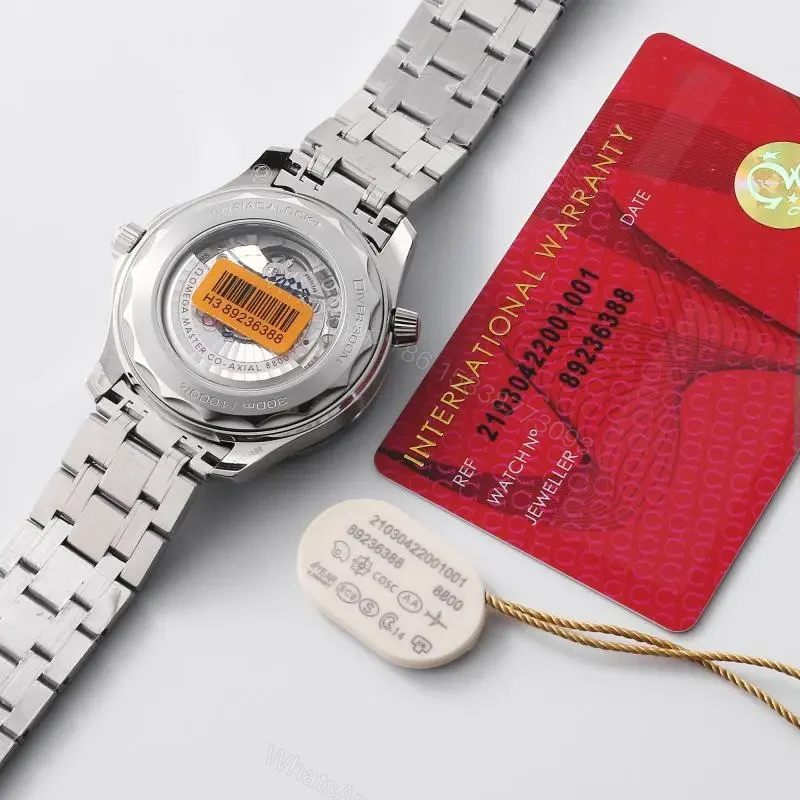 View 9 of Omega Seamaster 300M Replica Watch White Dial Blue Bezel 42mm Stainless Steel Case and Bracelet Custom 8800 Movement