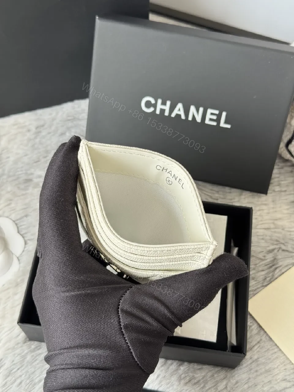 View 2 of Quilted Lambskin Wallet | Silver Logo, Compact & chic