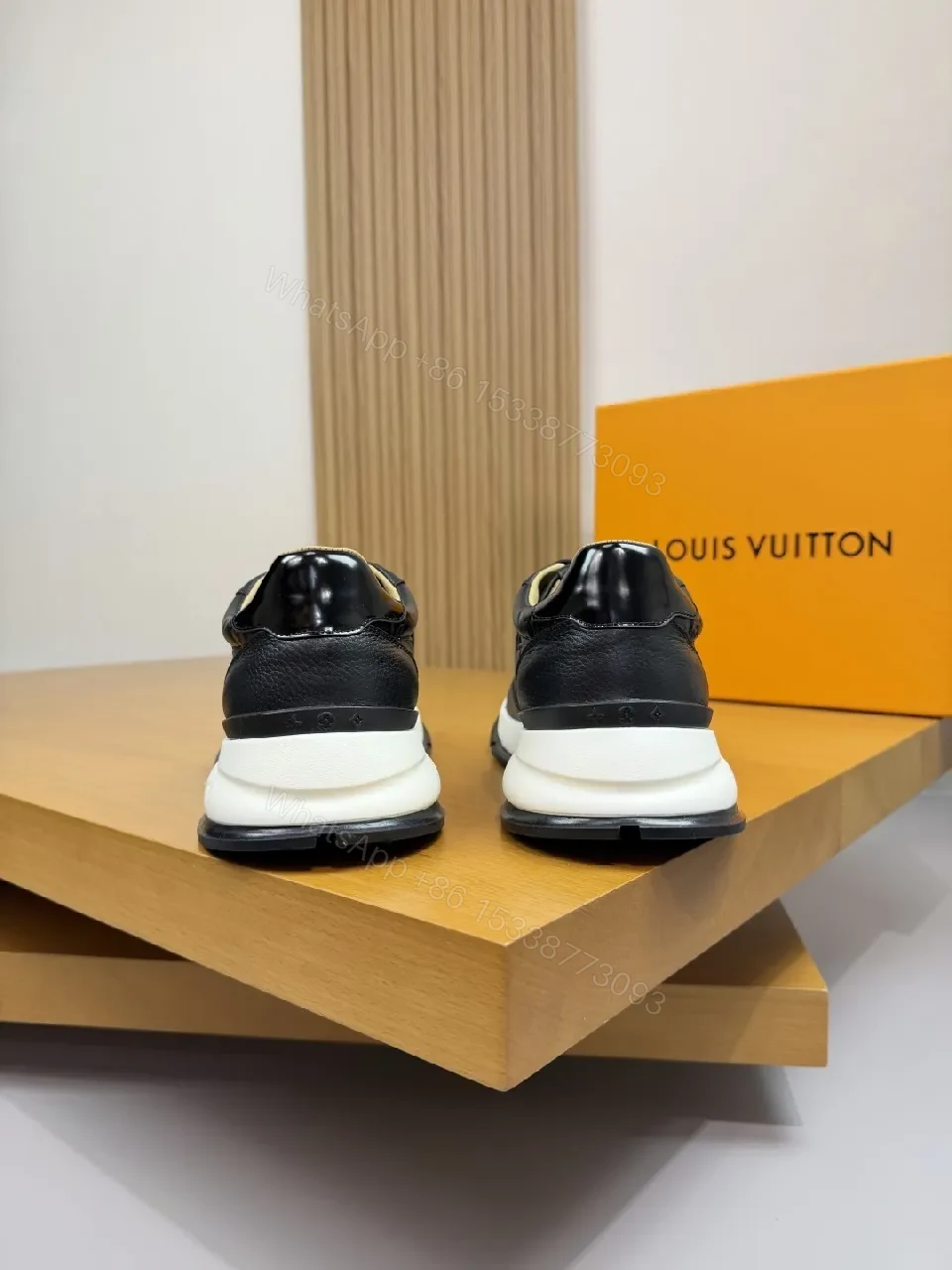View 7 of Black Leather Trainer with Subtle Monogram Detailing - Everyday Luxe Comfort