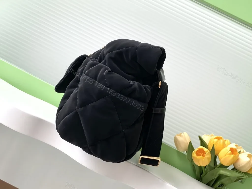 View 7 of Chic Quilted Black Bag with Gold Chain Detail - Compact Luxury