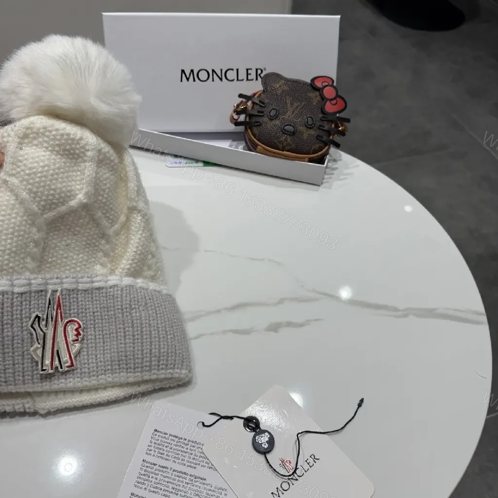 View 9 of Chic Winter Knit Beanie with Plush Pom and Moncler Accent