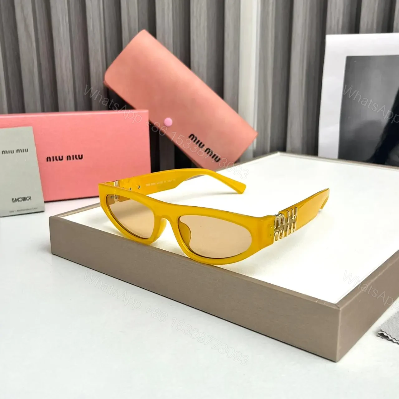 Miu Miu Cat Eye Yellow Sunglass Universal Frame — view 1