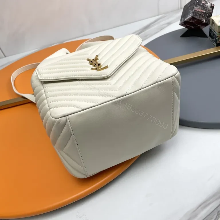View 4 of Chic Quilted Backpack with Gold Emblem â€“ Modern Luxury Backpack