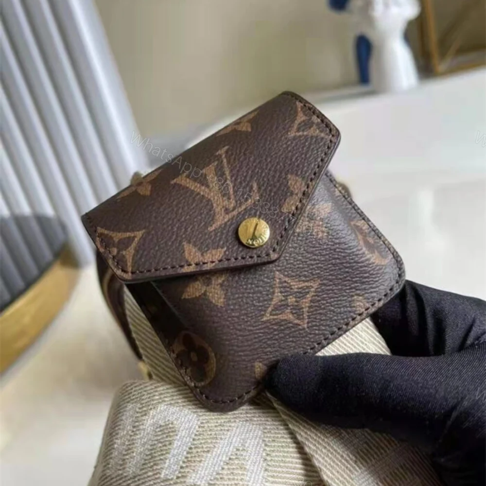 View 7 of Louis Vuitton Utility Crossbody Bag Brown 18Cm M80446