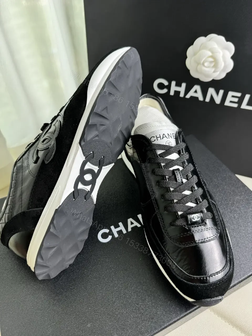View 6 of Chic Black Leather Trainer — Luxury Comfort, Subtle Logo