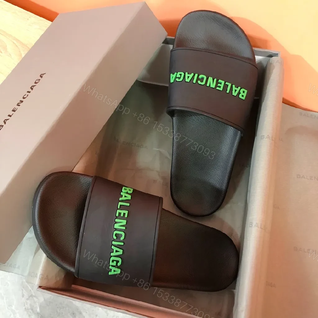 View 8 of Bold Neon Logo Slides: Black Comfort, Statement Style