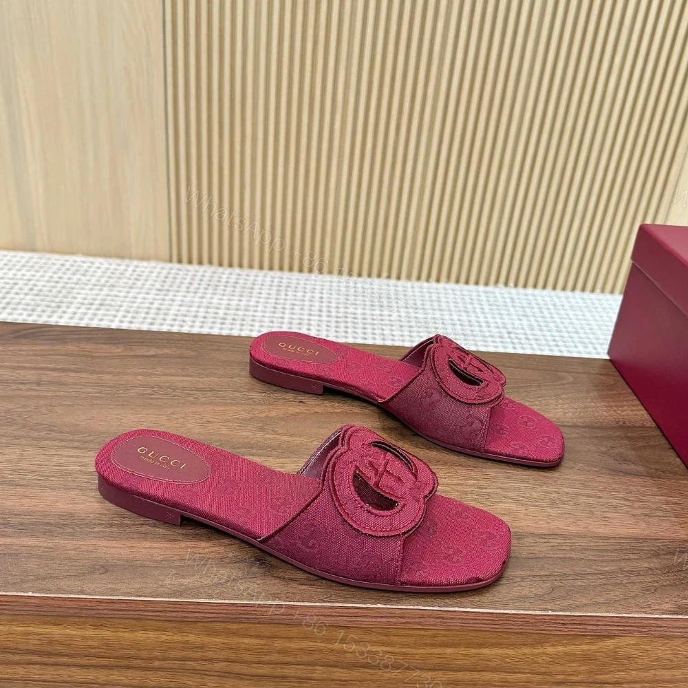 View 3 of GUCCI WOMEN SLIDE SANDAL WITH INTERLOCKING G ROSSO ANCORA RED GG CANVAS ‎790447 9SF00 8549