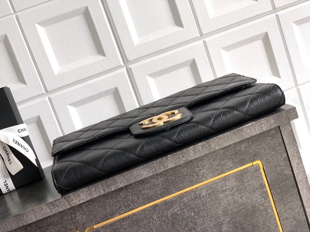 View 5 of Quilted Black Clutch with Gold-Accent Hardware Luxury Compact