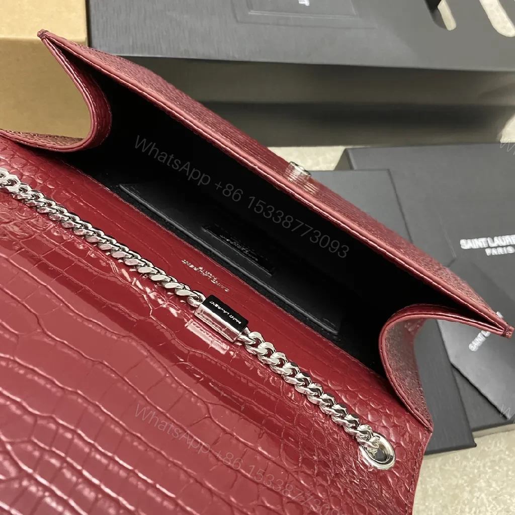 View 2 of Textured Burgundy Leather Clutch: Luxe Shine, All-Day Confidence