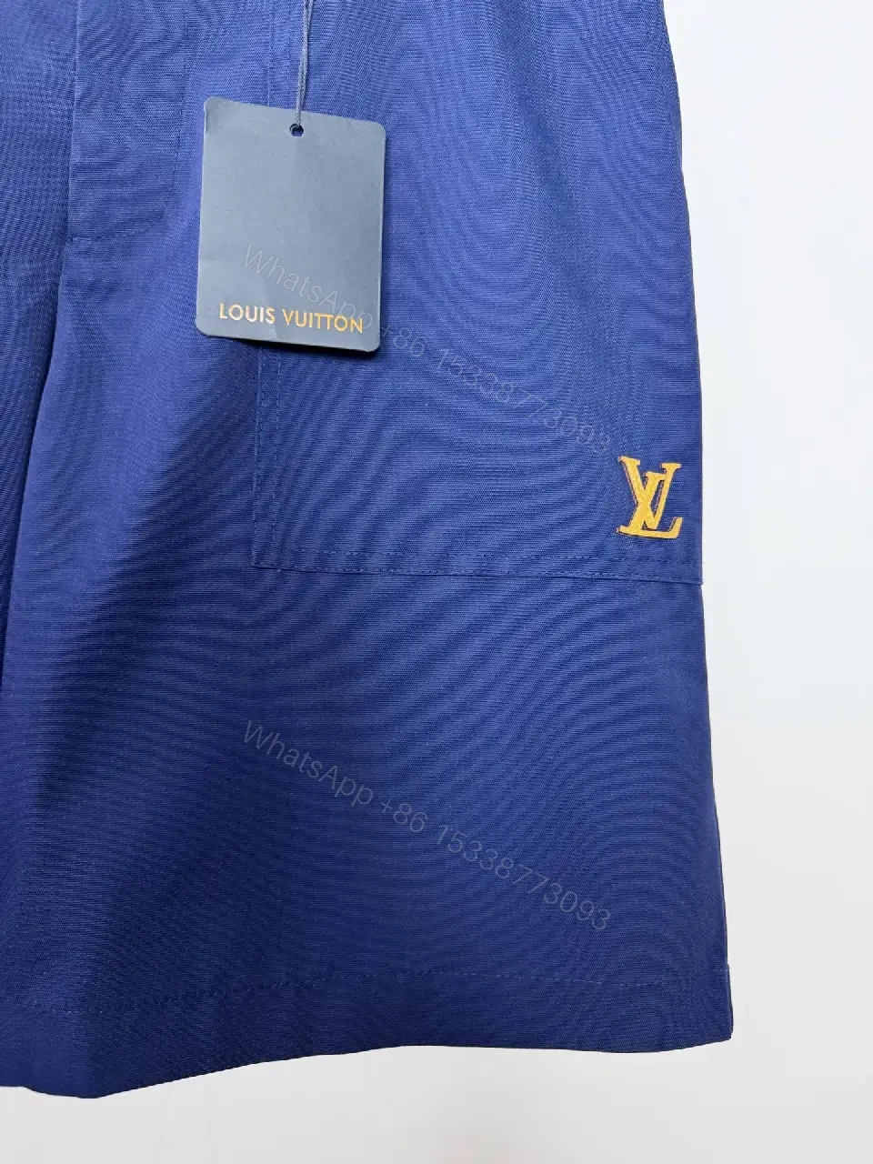 View 3 of Navy Linen Belted Bermuda Shorts Louis Vuitton Logo