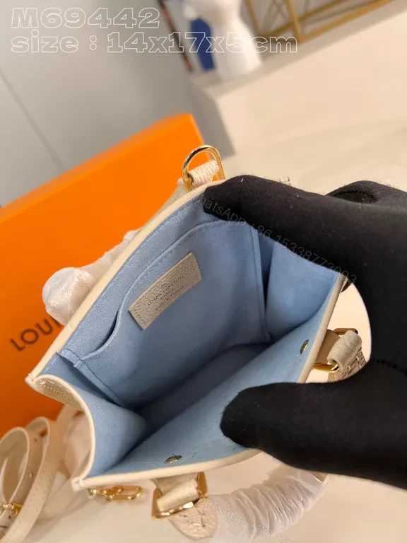 View 3 of Blue Monogram Calfskin Mini Top-Handle Bag - LV Chic Luxury