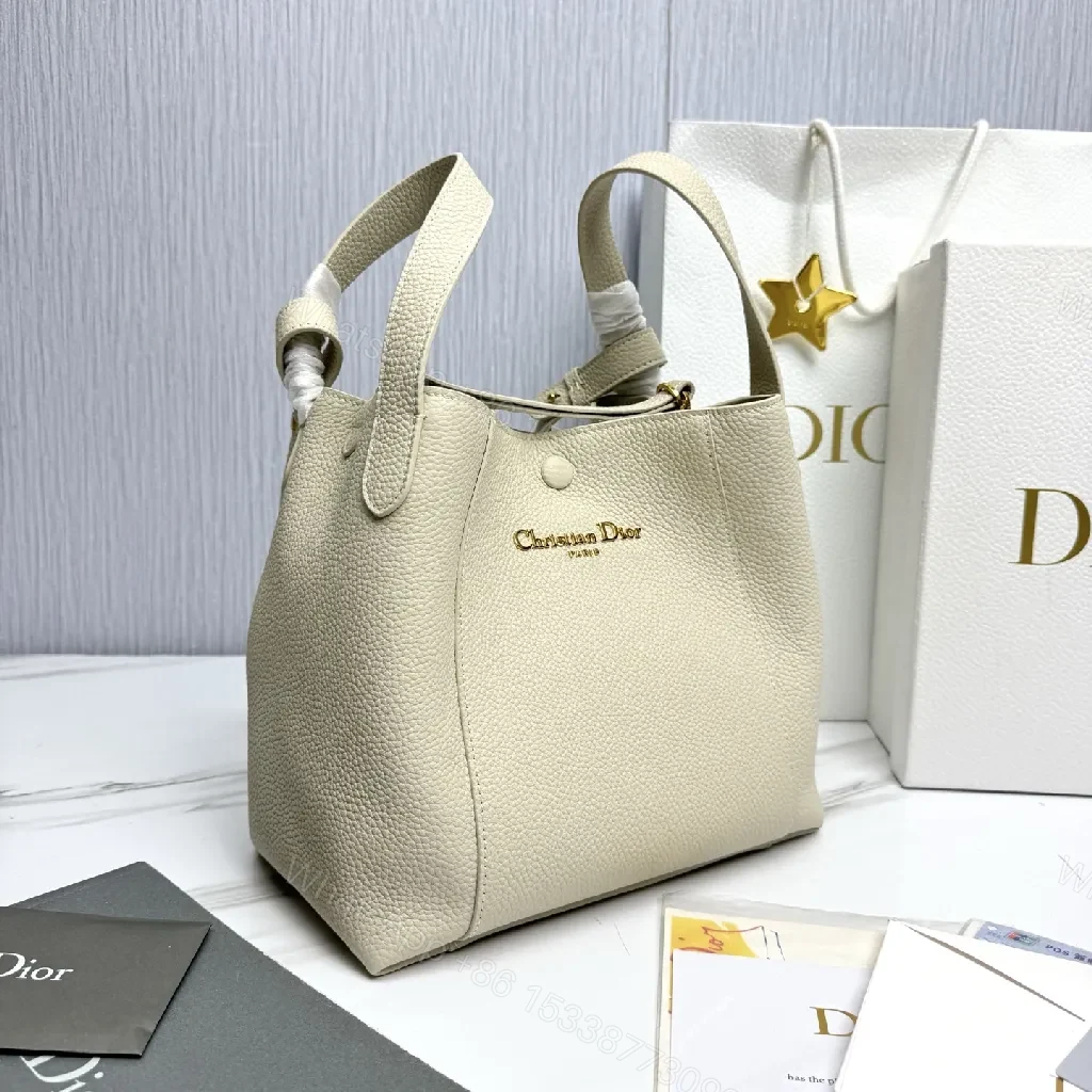 View 4 of Pebbled Leather Minimalist Bucket Bag - All-Day Luxury