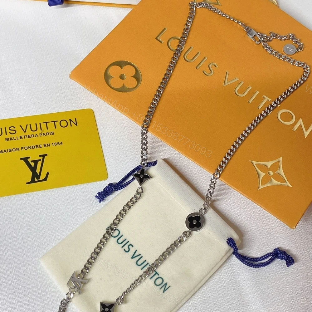 View 7 of LOUIS VUITTON LV SPIKE CHARMS NECKLACE SILVER M01717