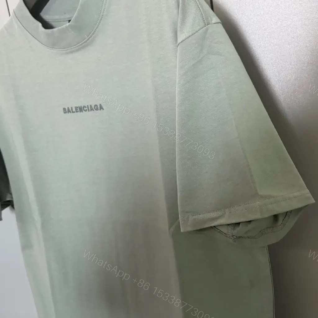 View 7 of Mint Green Minimalist Tee: Soft-Cotton, Refined Logo, Everyday Luxury