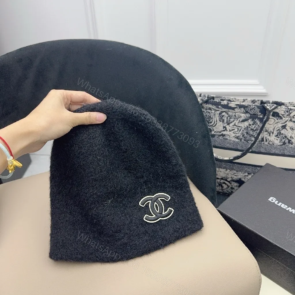 View 6 of Ivory Plush Handwarmer: Luxe Logo-Embossed, Lightweight Warmth