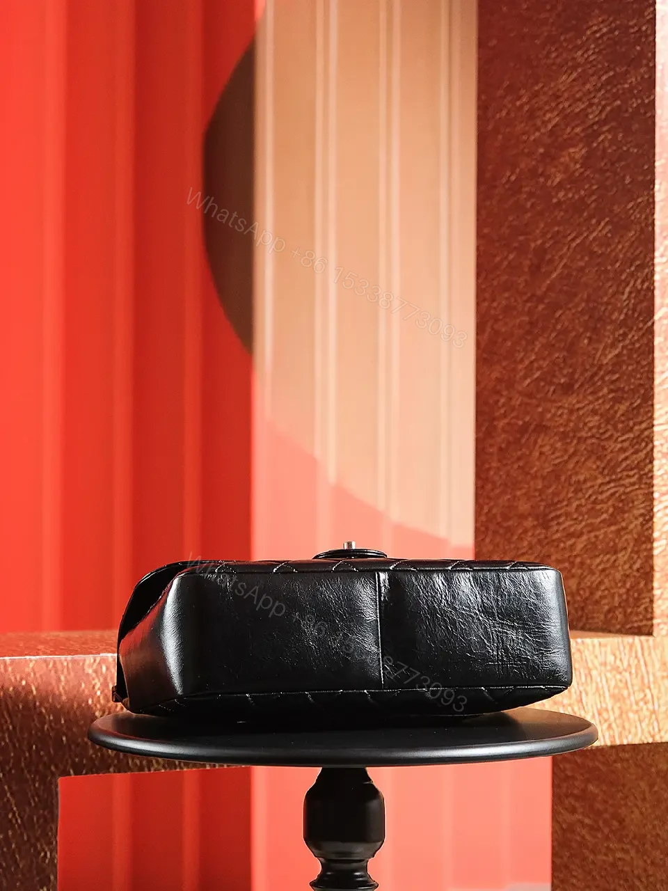 View 6 of Black Quilted Leather Handbag - Classic Chic, Compact Luxury