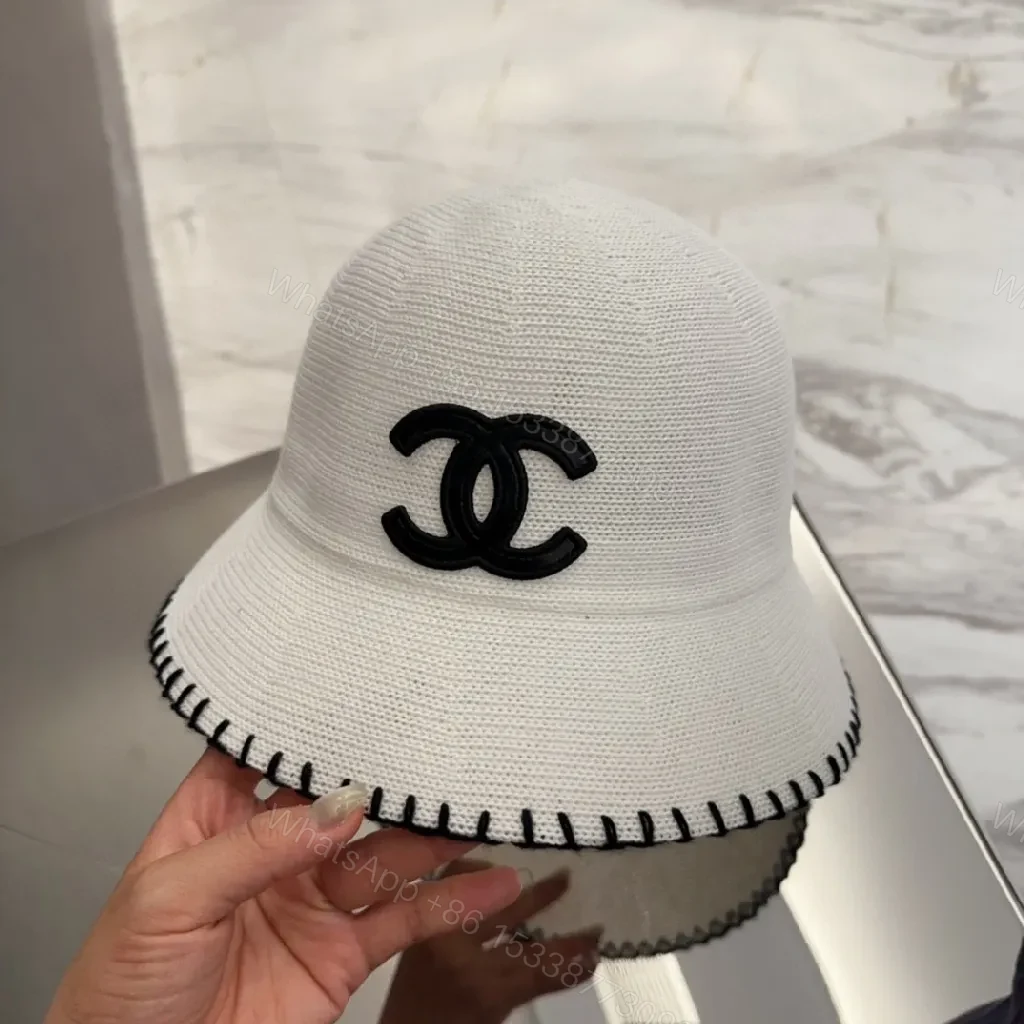 View 3 of Ivory Bucket Hat with Black Logo, Premium Stitching, one-size