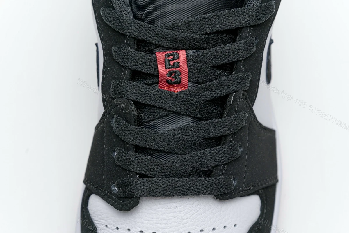 View 7 of Air Jordan 1 Low Black Toe 553558-116