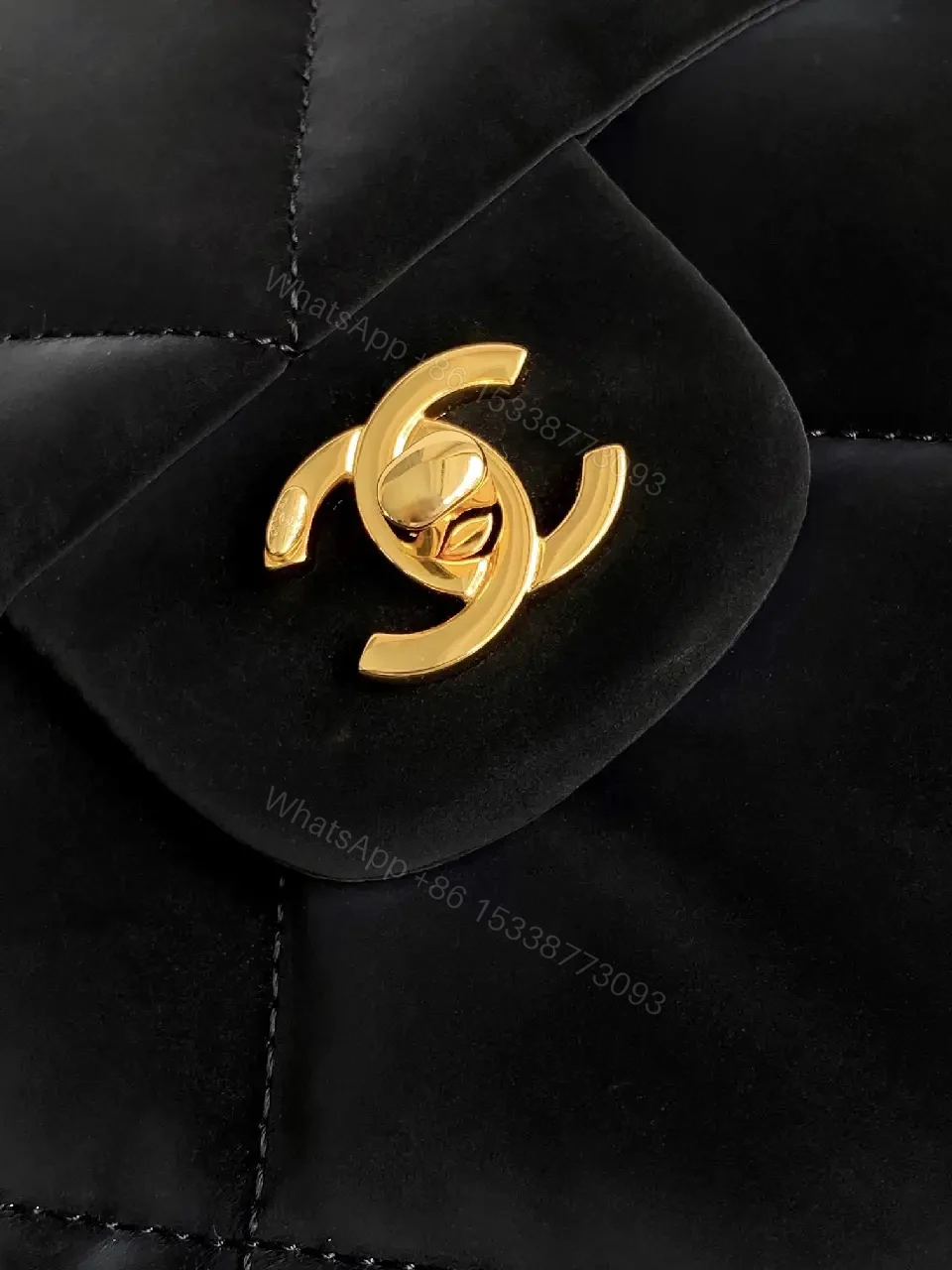 View 9 of Quilted Black Bag with Gold Chain - Compact Chic Signature