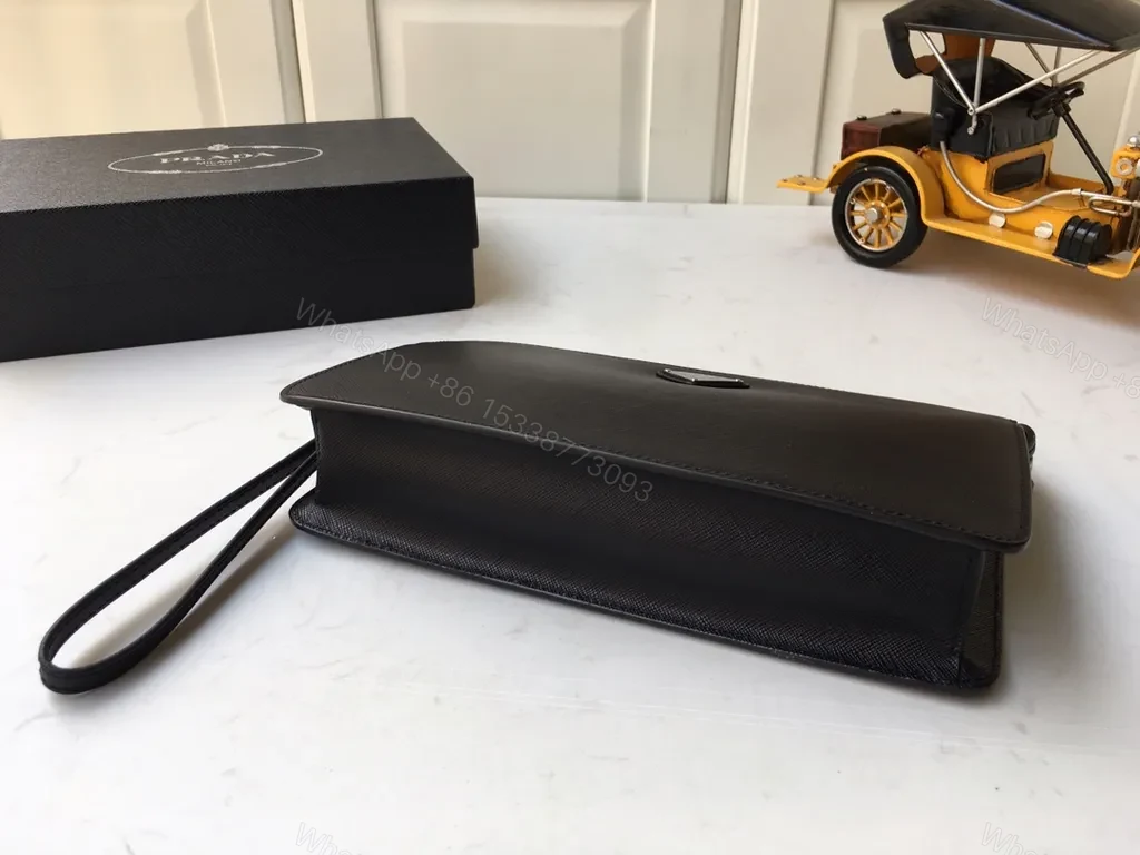 View 8 of Chic Black Saffiano Prada Clutch with Wrist Strap