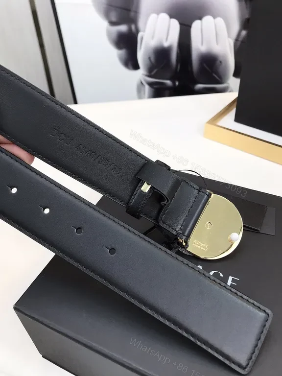 View 6 of Bold Medusa Buckle Belt: Luxury Black Leather Accessory