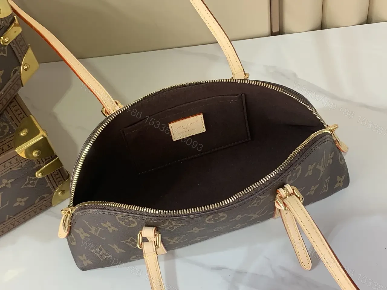 View 5 of Chic Monogram Barrel Bag: Structured, Luxurious Carryall